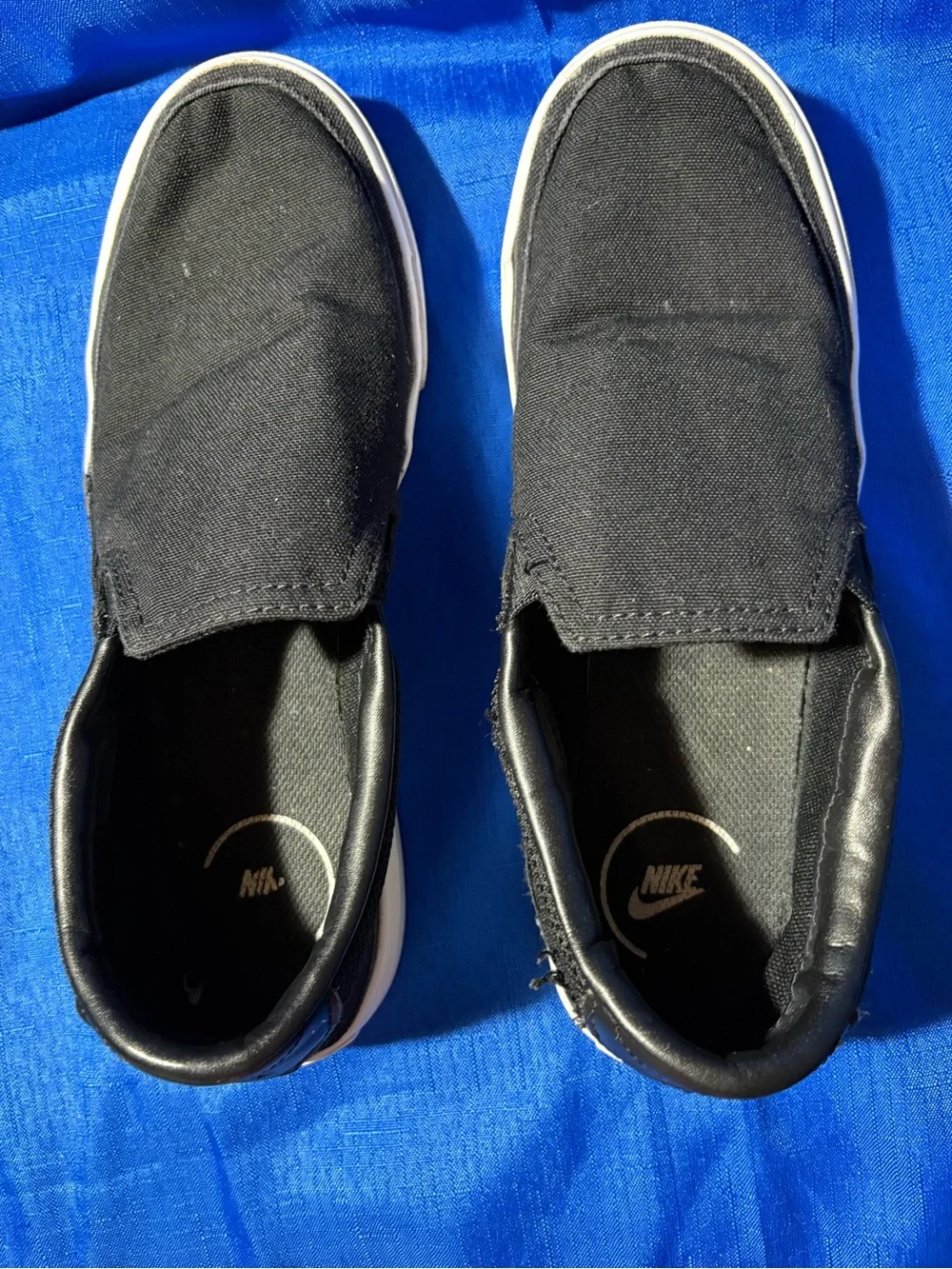 Nike Black Slip-On Canvas Sneakers with White Swoosh